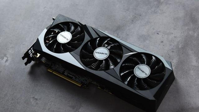 A cryptocurrency miner inspecting a Kadena ASIC
